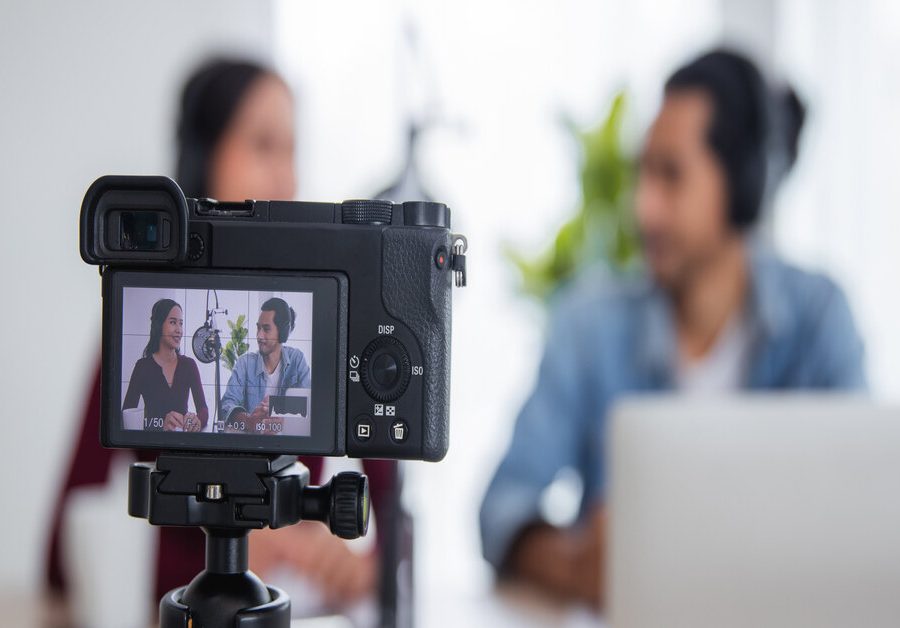 Close up camera record in studio two Asian radio hosts recording Struggling to Make Video Marketing Work?